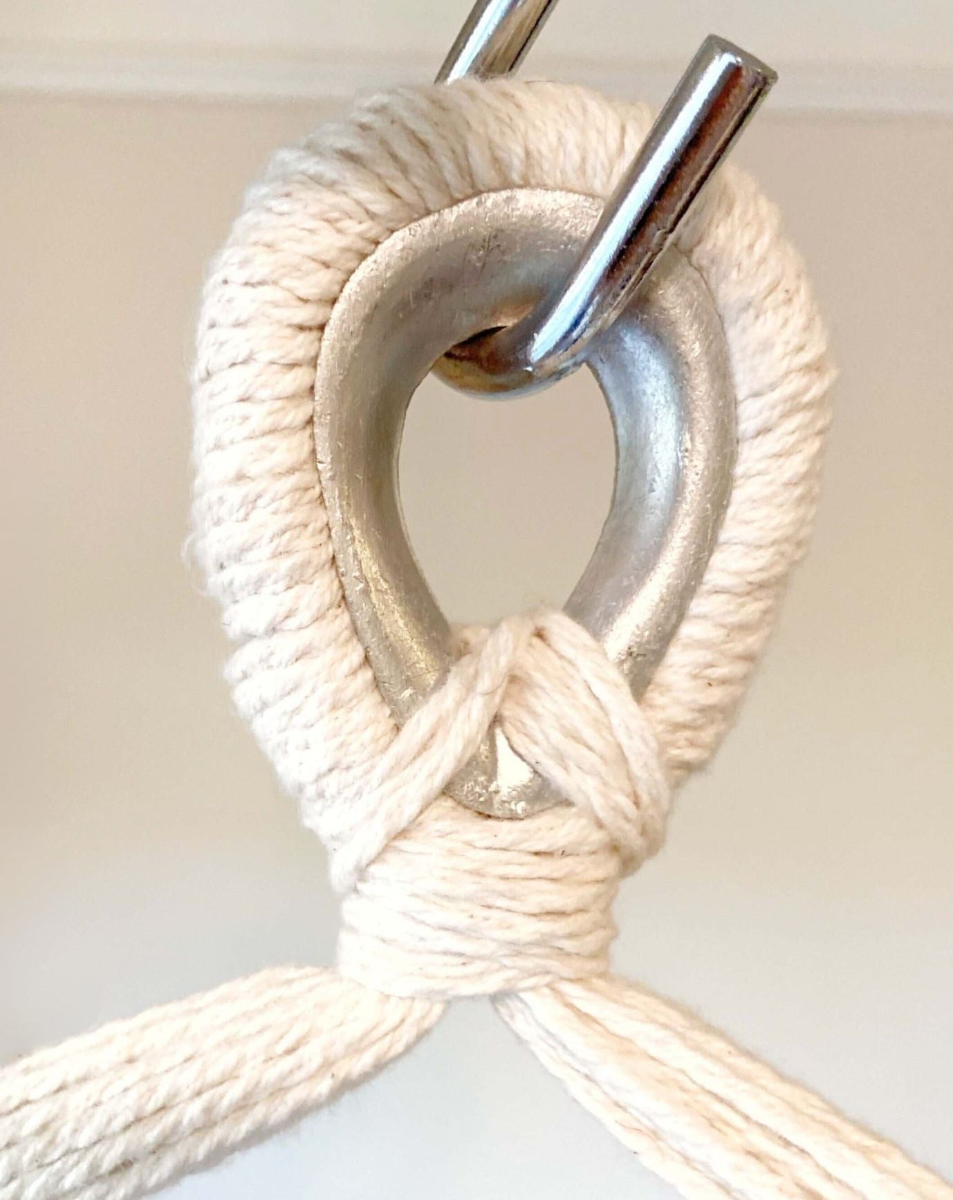 closeup of metal hanging eye hammock chair