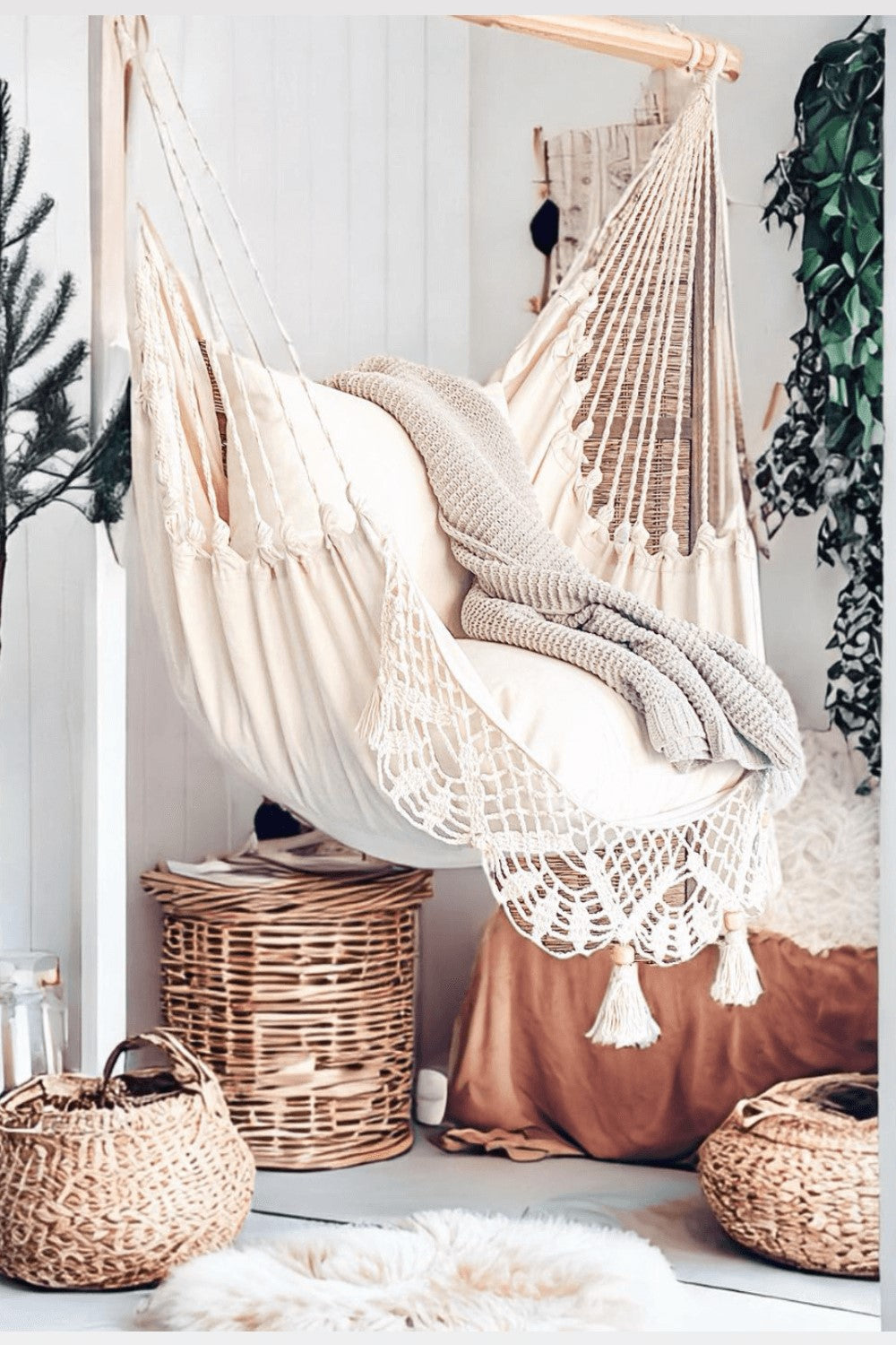 indoor crochet hammock swing chair with a throw blanket on top