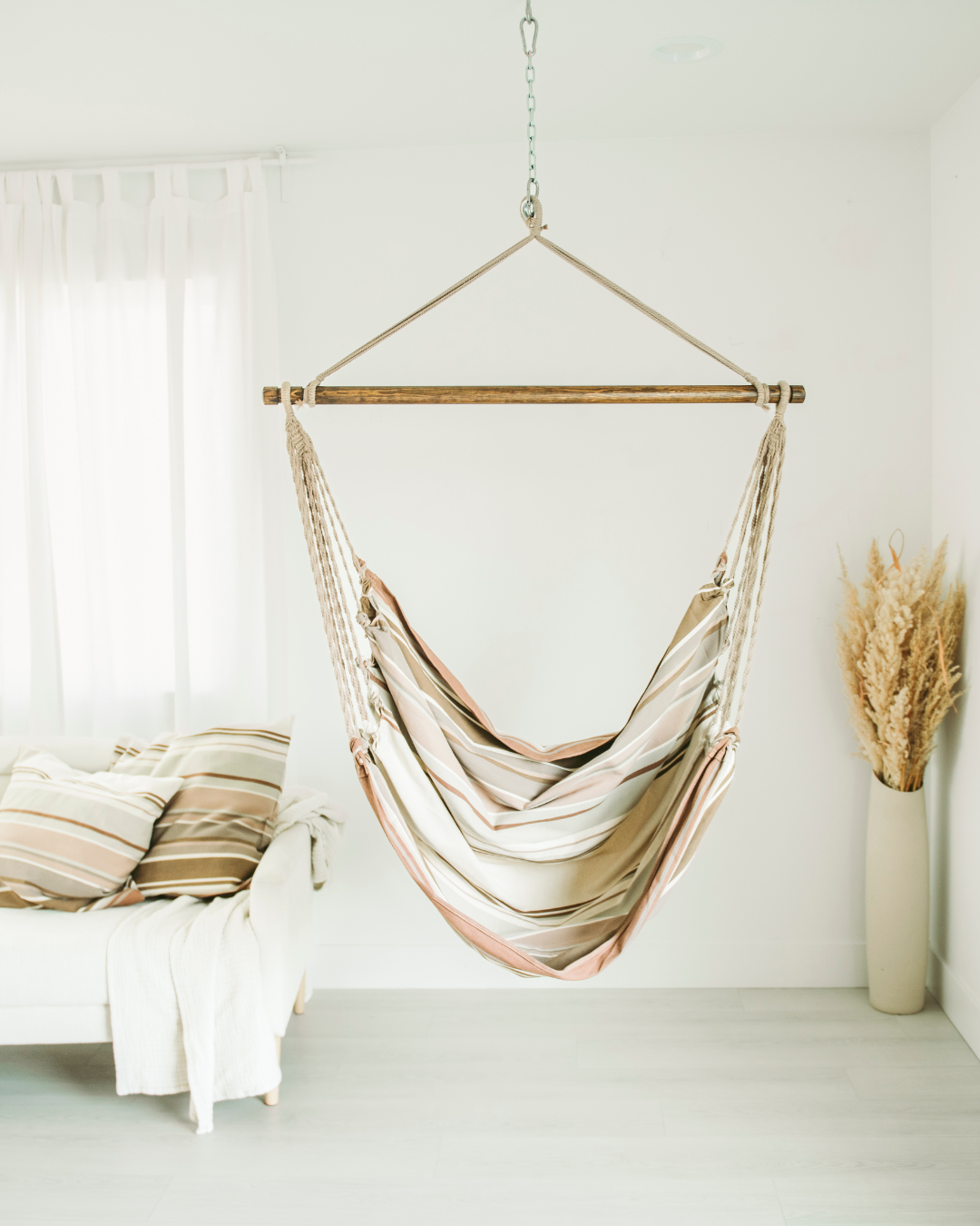 brown hammock chair with boho style decor