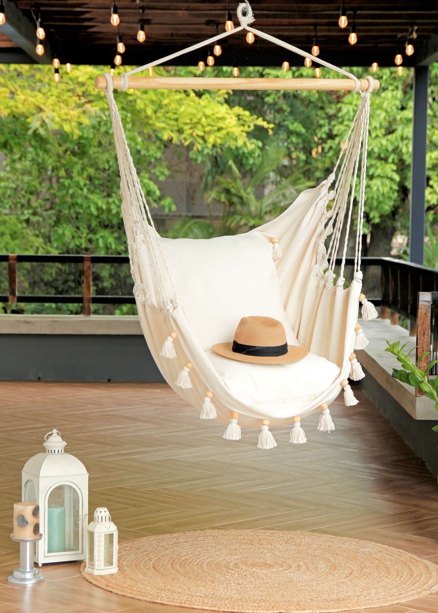 Boho Hammock Chair With Tassels in a porch with jute rug