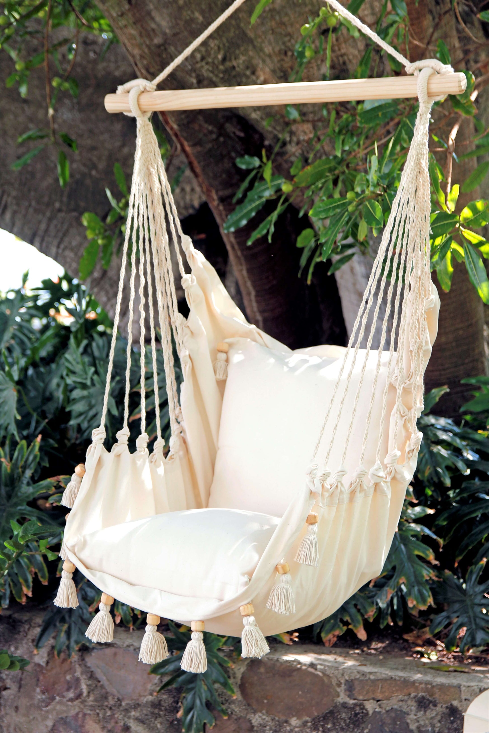 Hammock Chair With Tassels in a garden