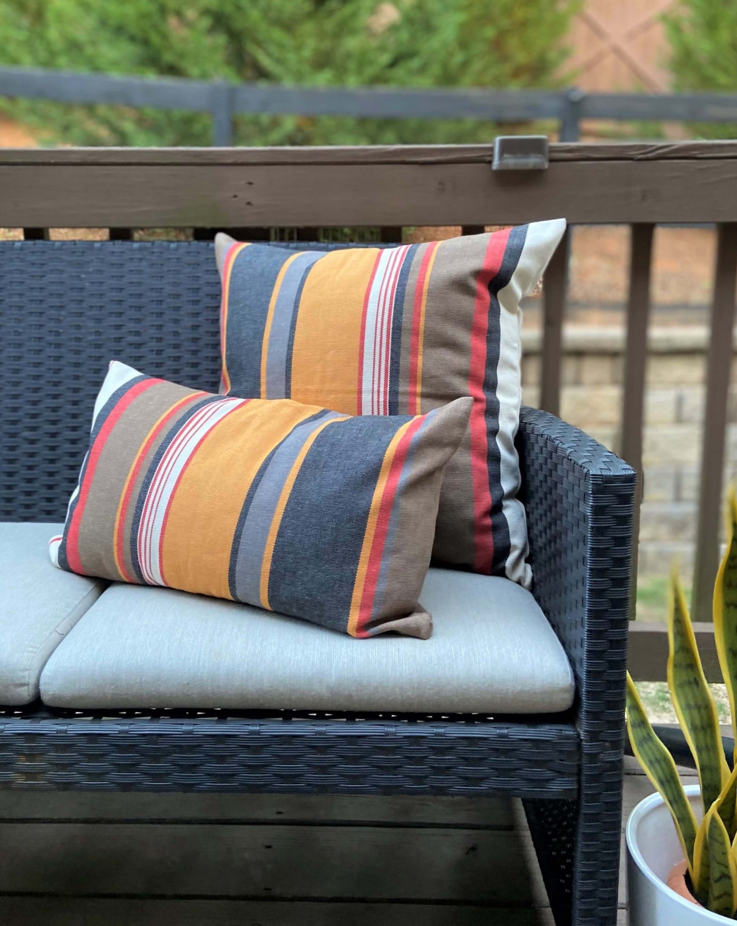 orange black red accent pillow