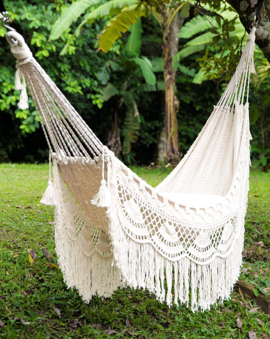 designer luxury hammock in a backyard