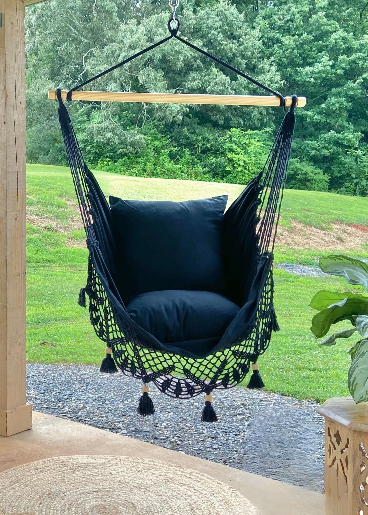 back crochet fringe hammock outdoors on a porch