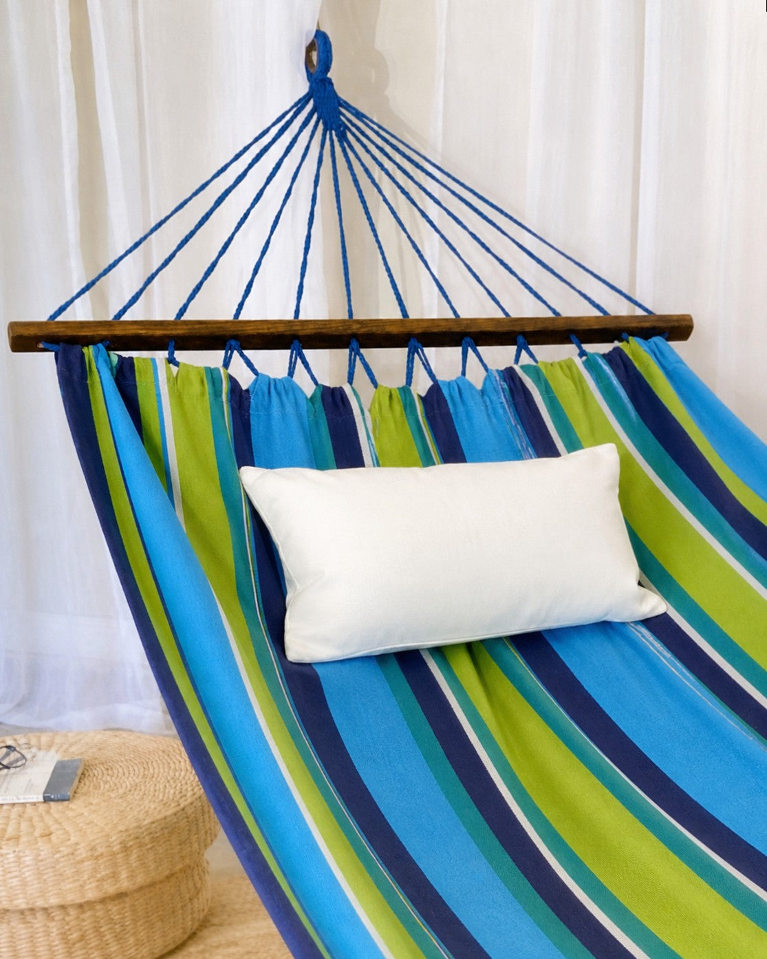  Hammock With Wood Spreader Bars and a white pillow