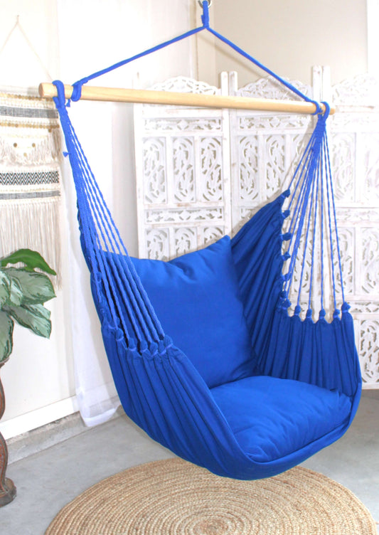 blue hanging chair hammock with swing in a room