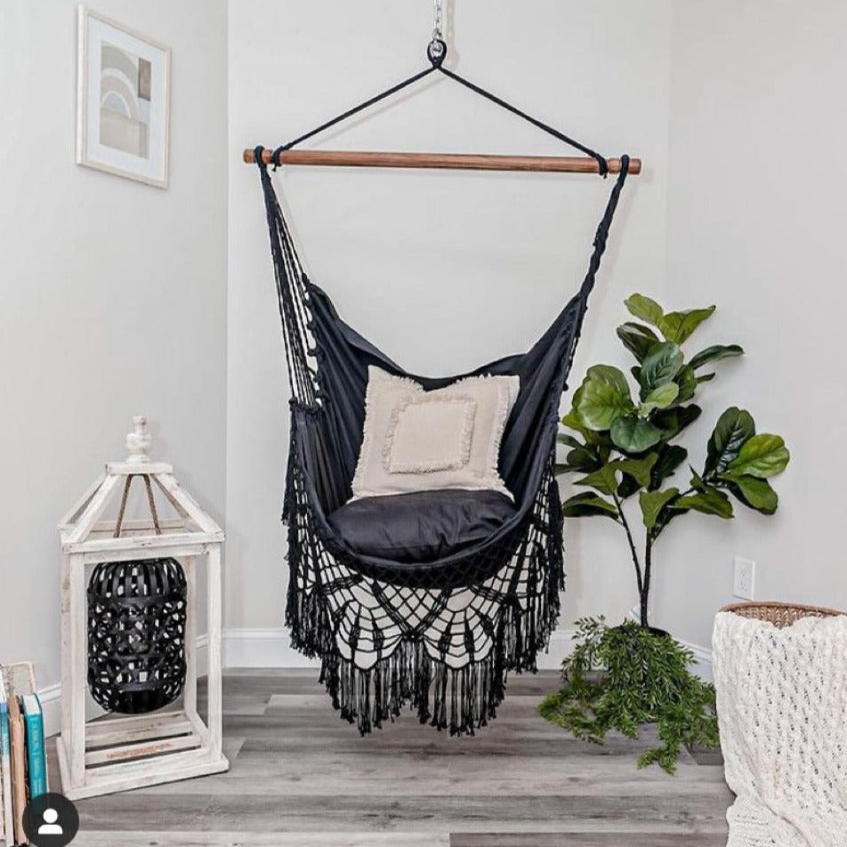 black crochet hammock swing chair in a living room