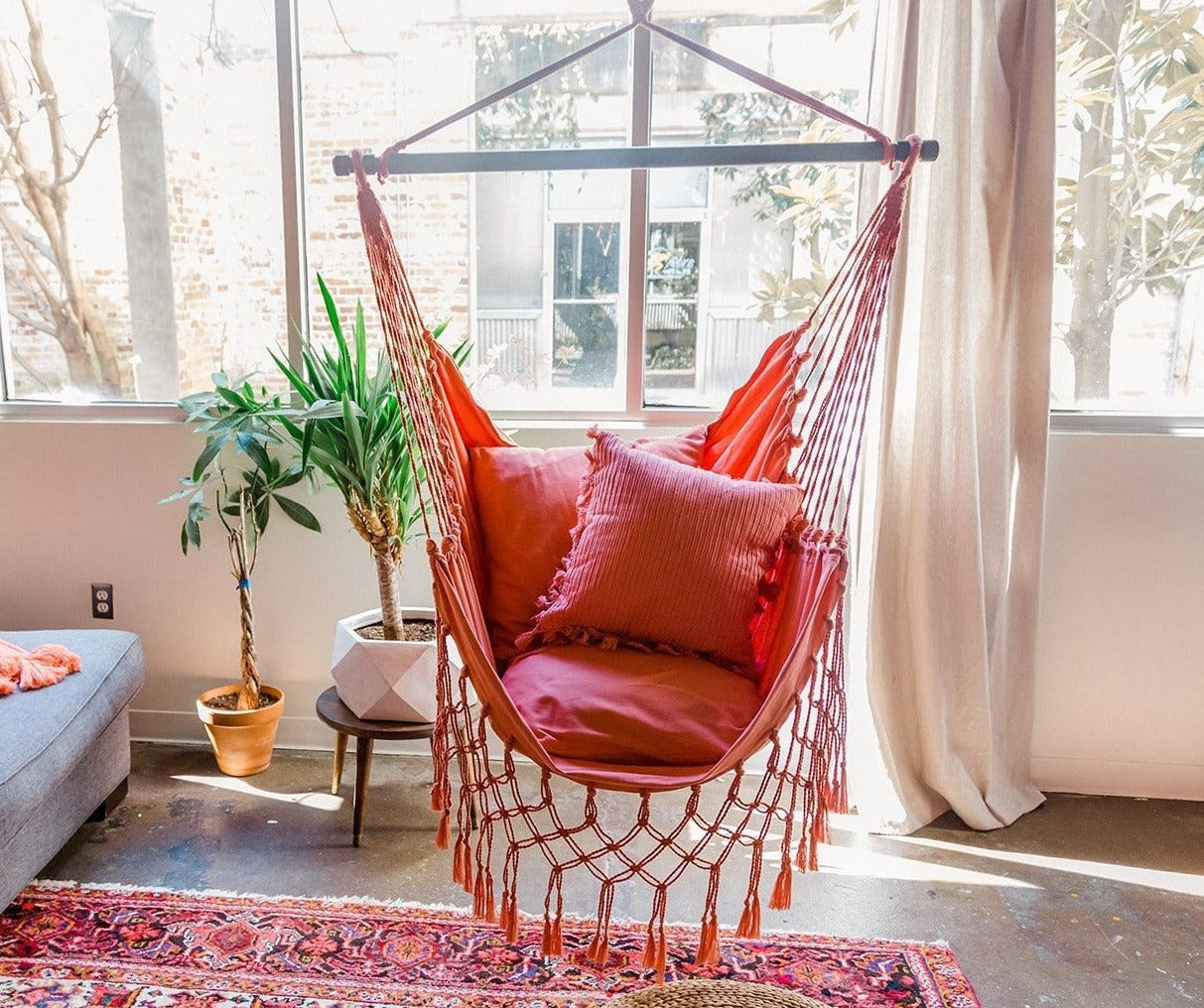 pink macrame hammock chair