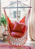pink macrame hammock chair